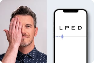 Man reading letters from phone for online vision exam