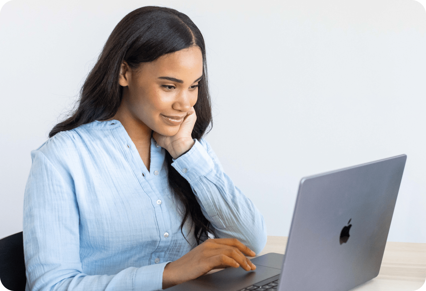Woman looking at her laptop