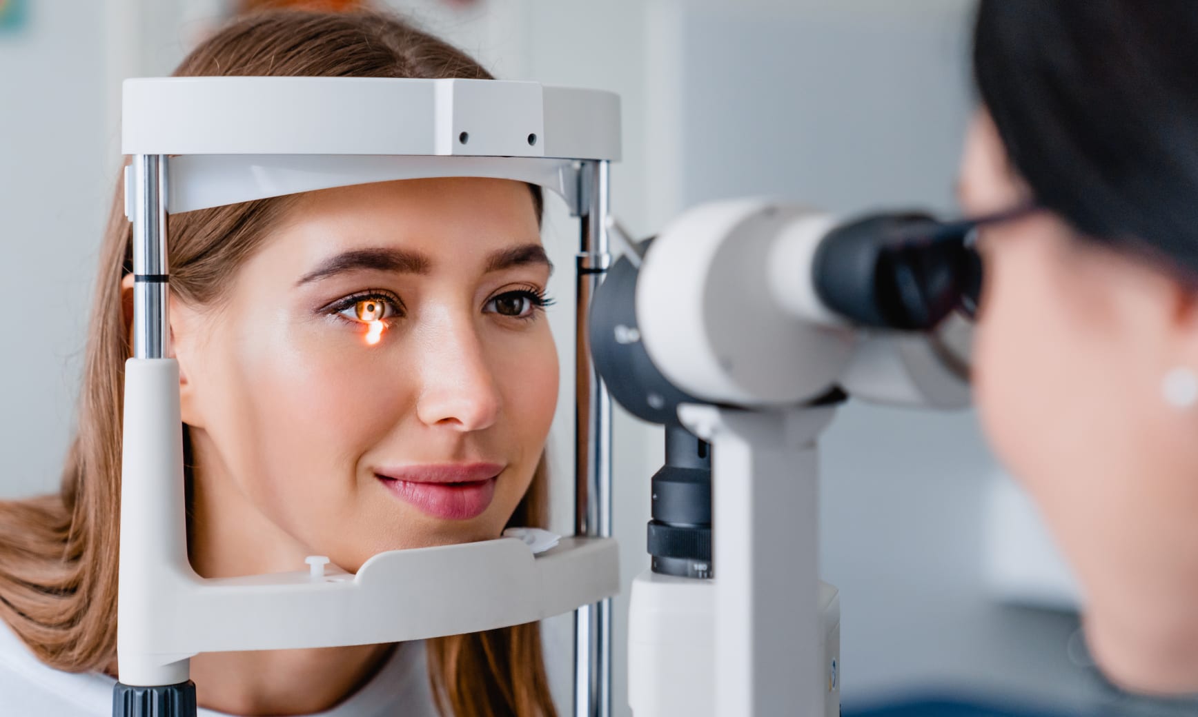 A patient receiving an eye exam